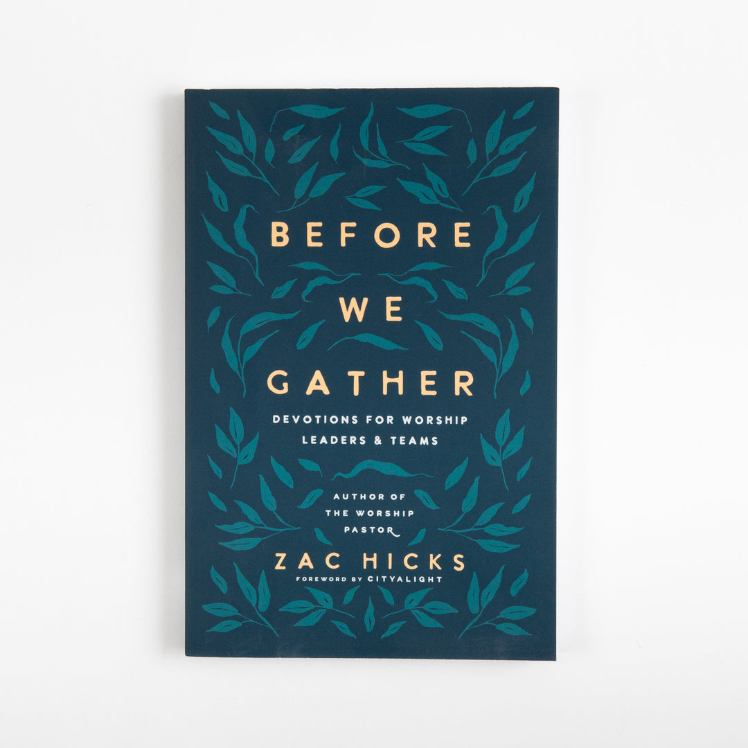Front cover of Before We Gather: Devotions for Worship Leaders and Teams by Zac Hicks, a dark teal book cover with a gold and teal leaf-vine pattern surrounding cream title text, subtitle &