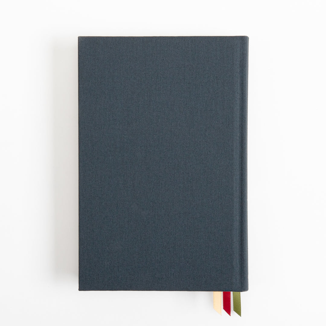 Overhead flat-lay of the closed hardcover book&