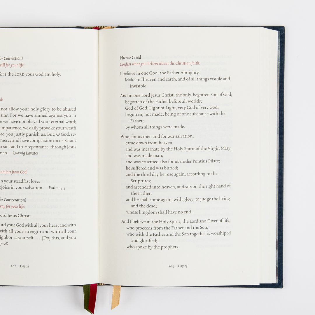 Open interior spread on pages 162-163: the right page presents the full text of the Nicene Creed under the orange heading &
