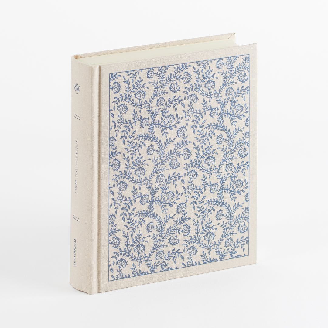 ESV Journaling Bible - Red Letter - Flowers – standing angled view with cream cloth spine and blue floral cover – three-quarter product view