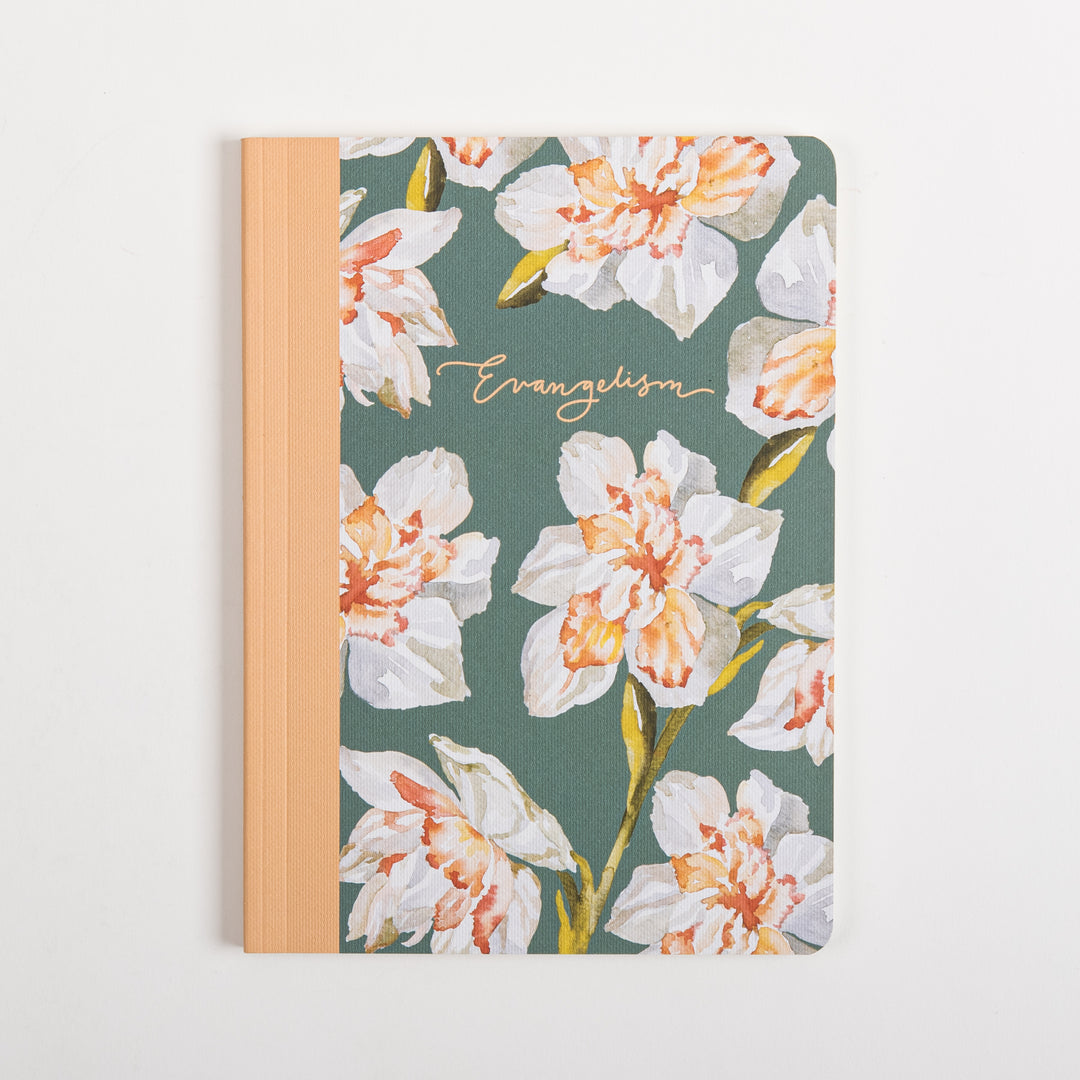 Front cover of the ESV Prayer Journal: 30 Days on Evangelism, lying flat. A sage green fabric cover is printed with a watercolor pattern of large white daffodils with peach and orange centers, a peach cloth spine on the left edge, and "Evangelism" written in gold cursive script.