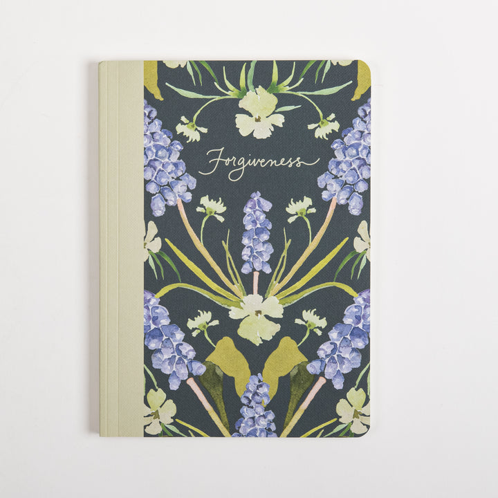 Straight-on front cover of the ESV Prayer Journal: 30 Days on Forgiveness, showing a cream fabric spine beside a dark green cover with a symmetrical, mirror-image watercolor pattern of purple grape hyacinth spikes and pale yellow wildflowers, with &