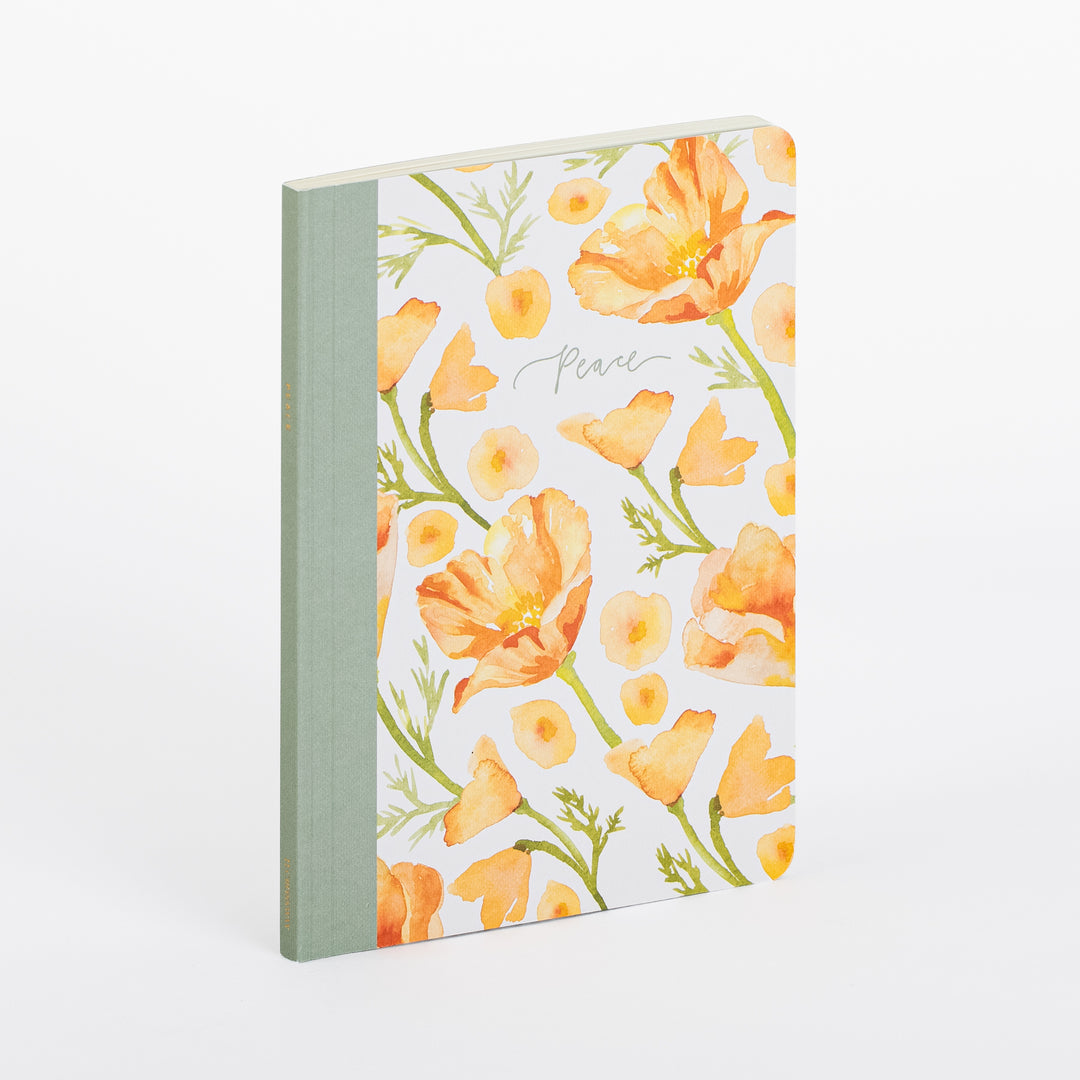 Three-quarter angled view of the ESV Prayer Journal: 30 Days on Peace standing upright, showing the book's thickness and the sage-green spine with small printed text running vertically, alongside the orange watercolor poppy cover design and 'Peace' script title.