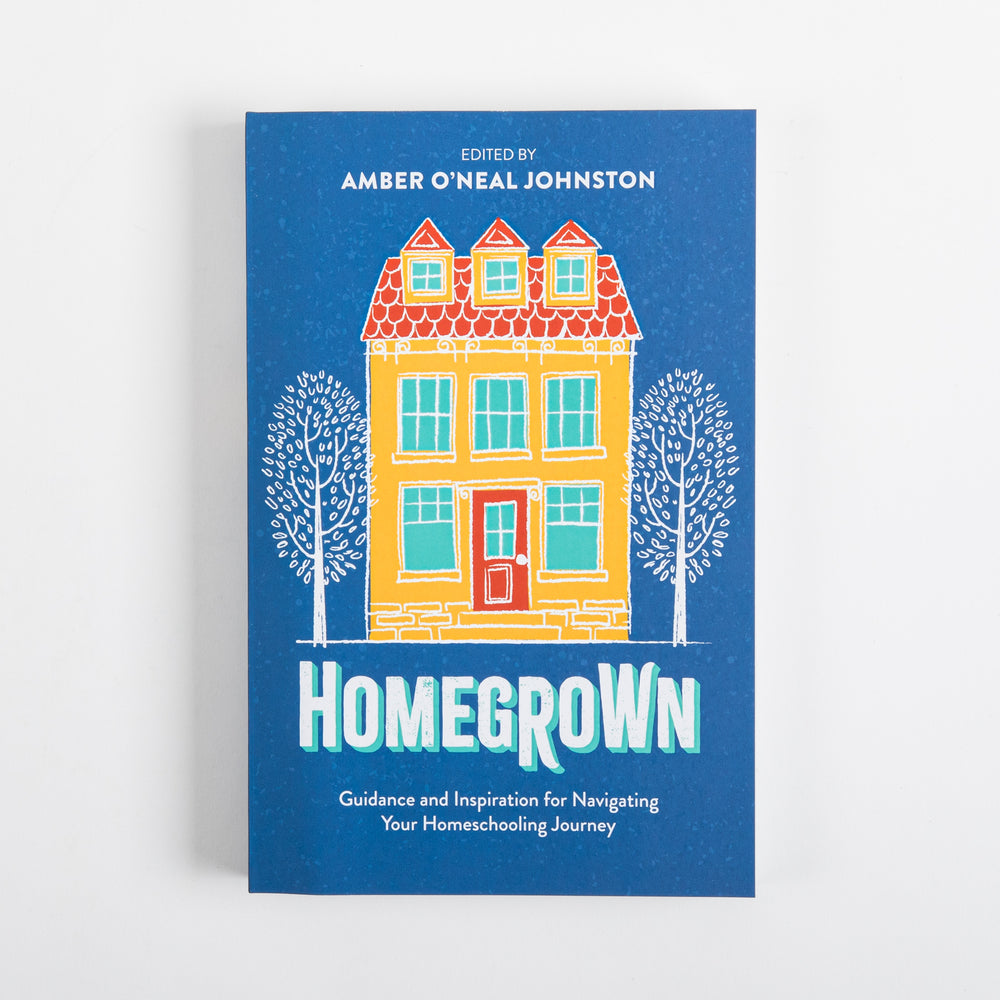Front cover of Homegrown: Guidance and Inspiration for Navigating Your Homeschooling Journey, edited by Amber O'Neal Johnston, featuring a colorful illustration of a yellow two-story house with a red shingled roof and turquoise windows, flanked by two bare white trees on a blue background.