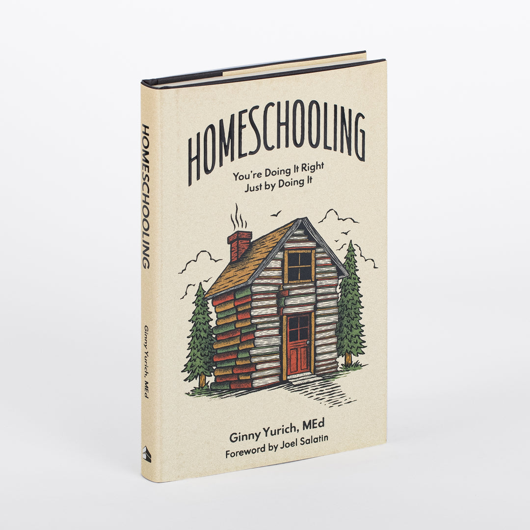 Tan hardcover of 'Homeschooling: You're Doing It Right Just by Doing It' by Ginny Yurich, MEd, foreword by Joel Salatin, angled to show the front cover and spine, with a hand-drawn log cabin, stacked-book siding, pine trees, and a smoking chimney.