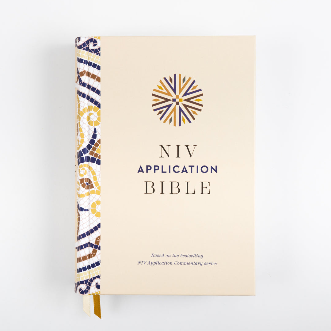 Front cover of the NIV Application Bible hardcover, cream with a mosaic-patterned spine in blue, gold, and brown