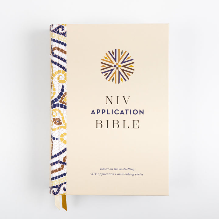 Front cover of the NIV Application Bible hardcover, cream with a mosaic-patterned spine in blue, gold, and brown