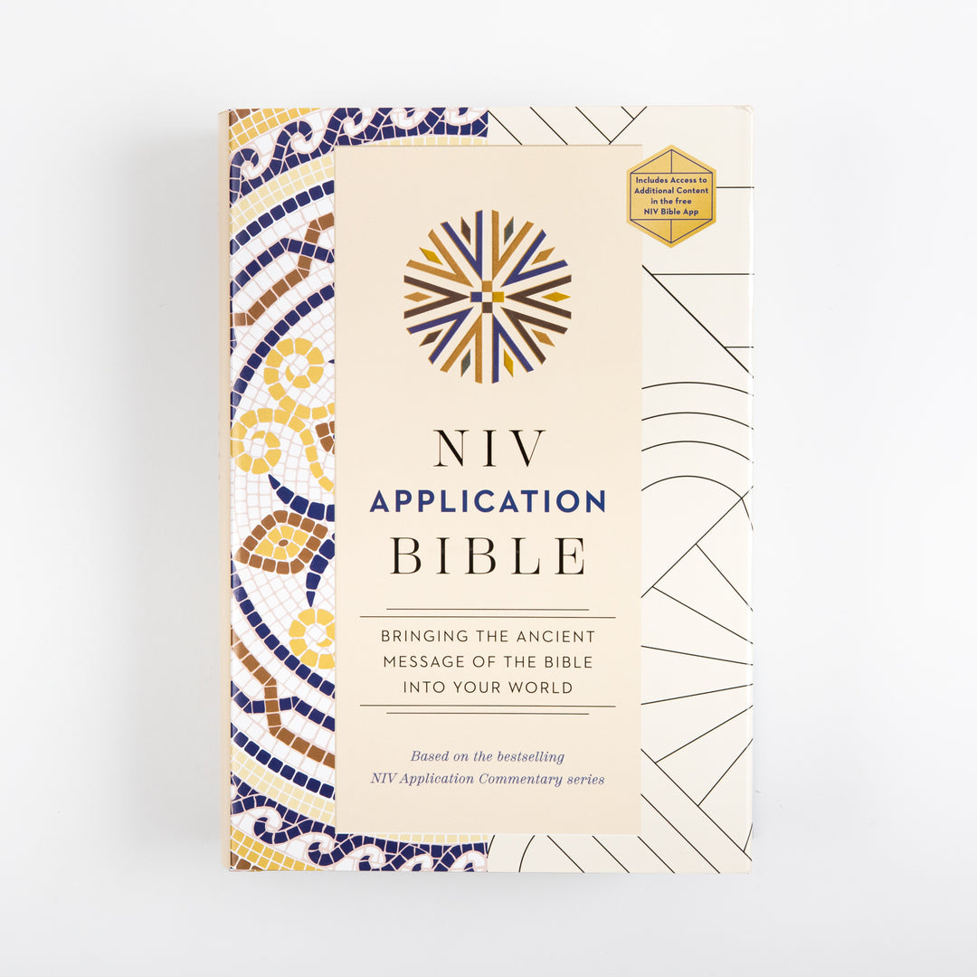 Front cover of the NIV Application Bible hardcover, cream with a blue and gold mosaic border, shown straight on