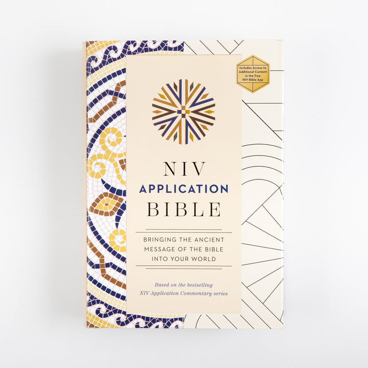 Front cover of the NIV Application Bible hardcover, cream with a blue and gold mosaic border, shown straight on