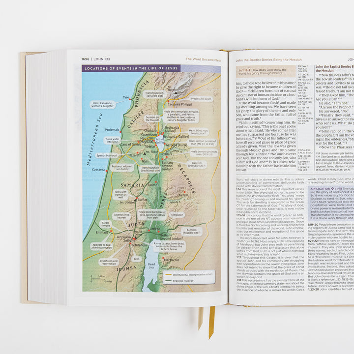 NIV Application Bible open to John 1, showing a map of the locations of events in the life of Jesus