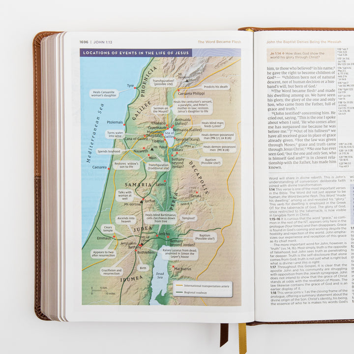 NIV Application Bible, leathersoft edition, open to John 1, showing a map of the locations of events in the life of Jesus