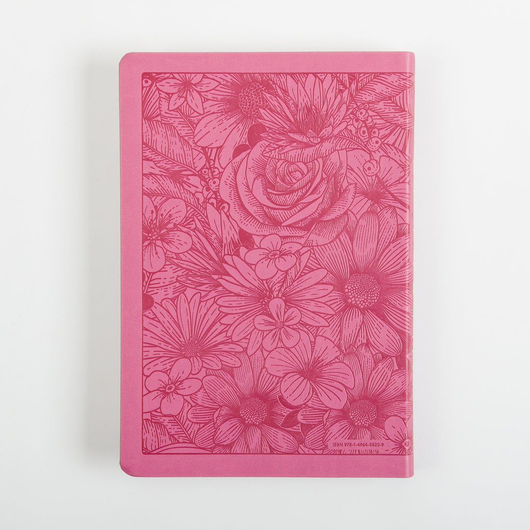 Flat back cover of the pink leatherlike Bible, engraved with the same darker pink floral line-art pattern of a rose, daisies, and leaves as the front, with a small ISBN number and barcode printed in the lower right corner.
