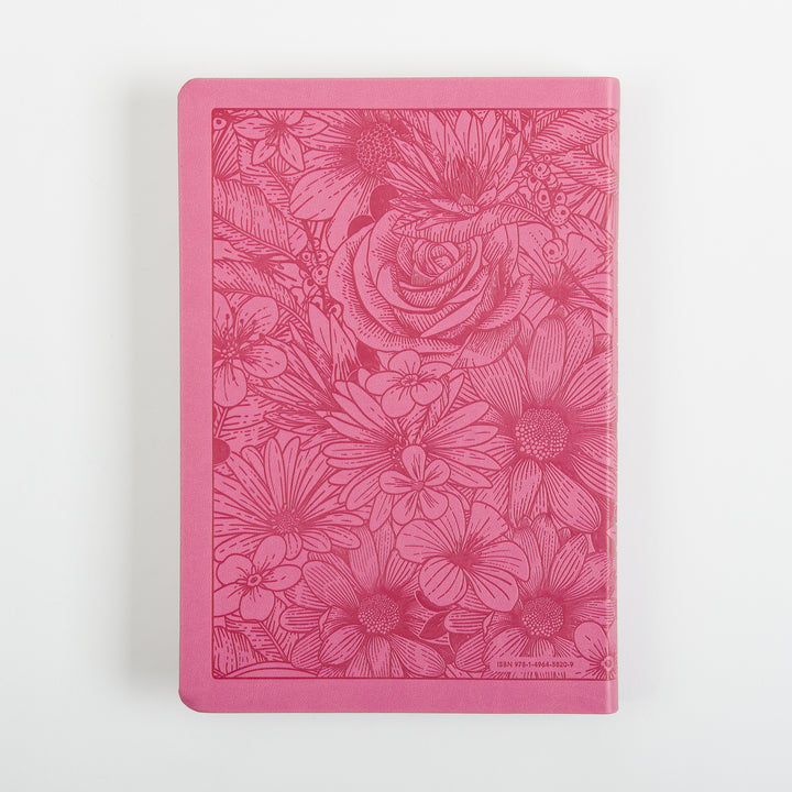 Flat back cover of the pink leatherlike Bible, engraved with the same darker pink floral line-art pattern of a rose, daisies, and leaves as the front, with a small ISBN number and barcode printed in the lower right corner.