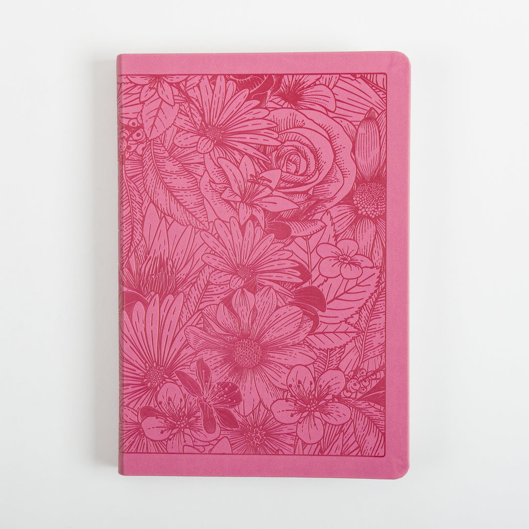 Flat front cover of a pink leatherlike Bible, engraved edge-to-edge in a darker pink line-art floral pattern featuring a large rose, daisies, and leaves within a debossed rectangular border with rounded corners.