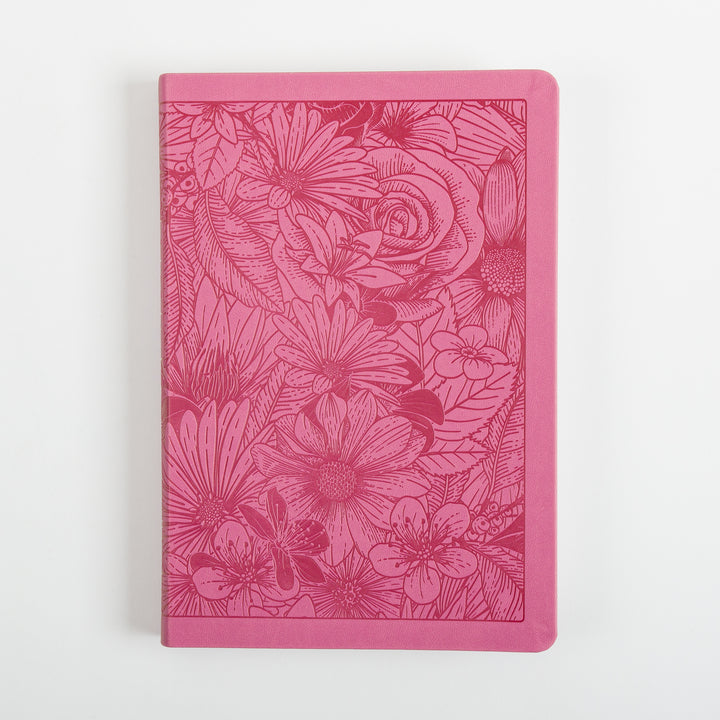 Flat front cover of a pink leatherlike Bible, engraved edge-to-edge in a darker pink line-art floral pattern featuring a large rose, daisies, and leaves within a debossed rectangular border with rounded corners.