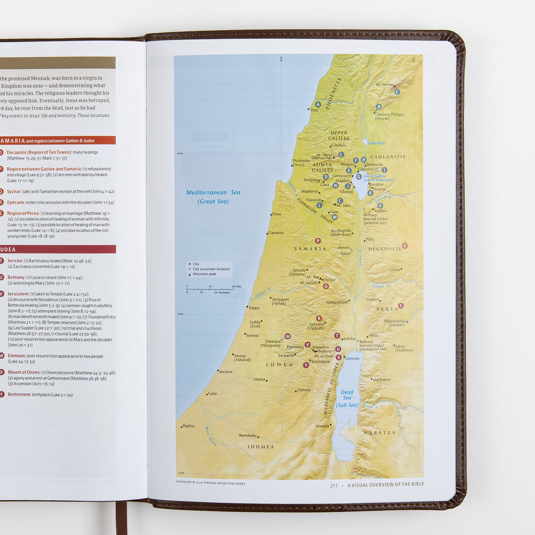 Open Bible spread from the color Visual Overview of the Bible section, showing a colored map of Galilee, Samaria, and Judea with numbered markers for events in Jesus&