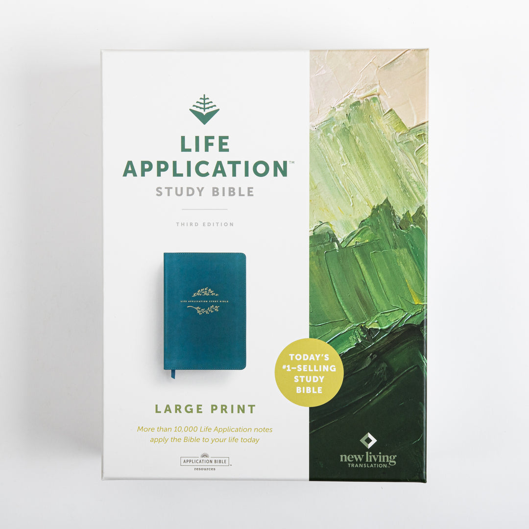 Front of the retail packaging box for the NLT Life Application Study Bible, Third Edition, Large Print, showing the teal Bible beside the title and a green watercolor-style cover image, with a badge reading &