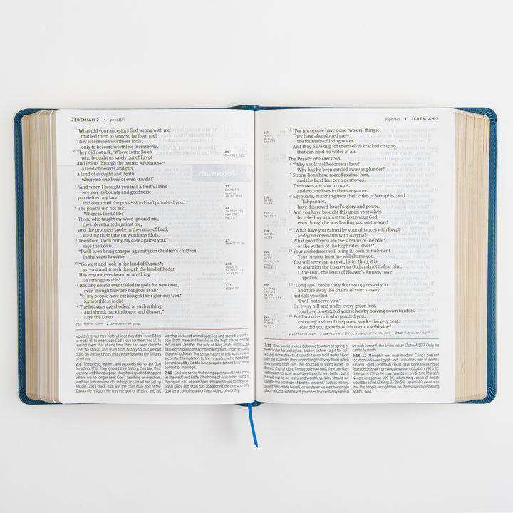Open Bible to Jeremiah 2, showing plain two-column Scripture text with small side-column cross-references and no additional study features on this spread.