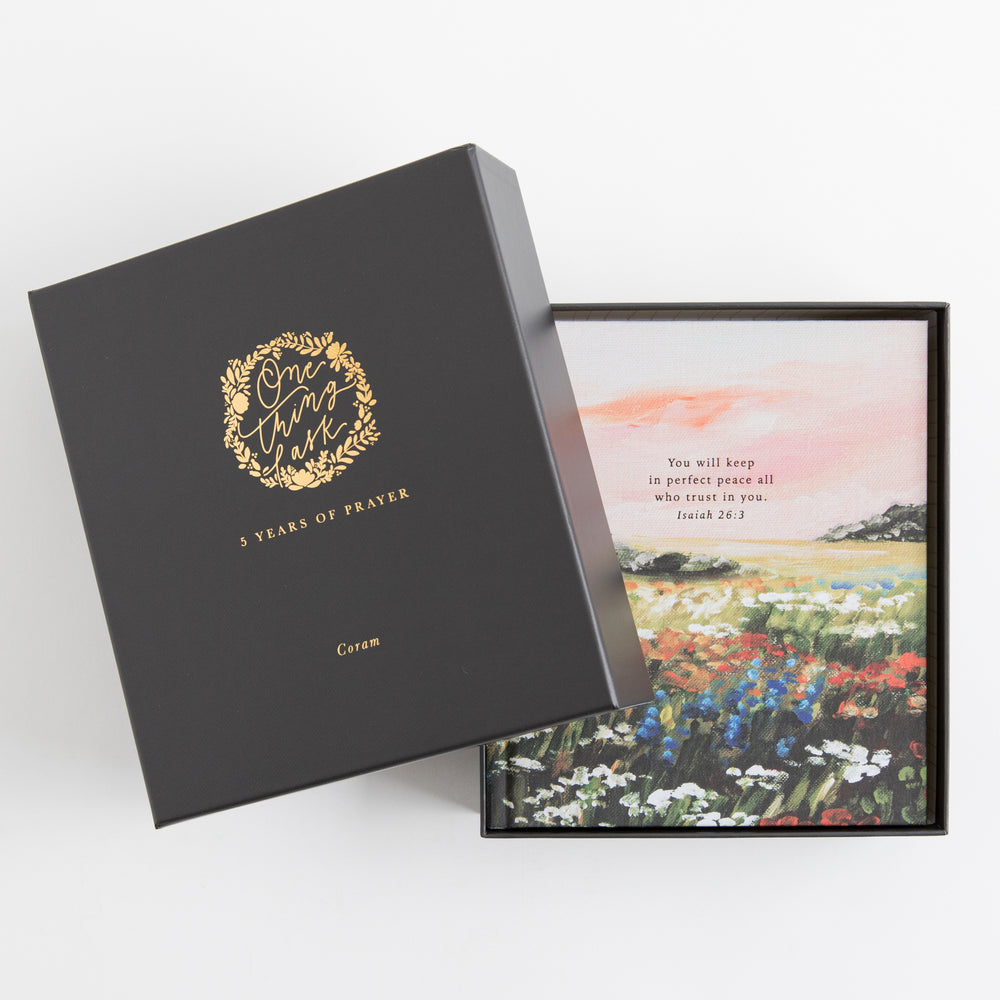 One Thing I Ask 5-Year Prayer Journal - Coram – black gift box open showing journal inside with gold foil One Thing I Ask logo on lid – gift packaging view