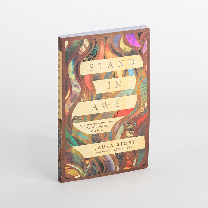 Angled view of the paperback cover of &