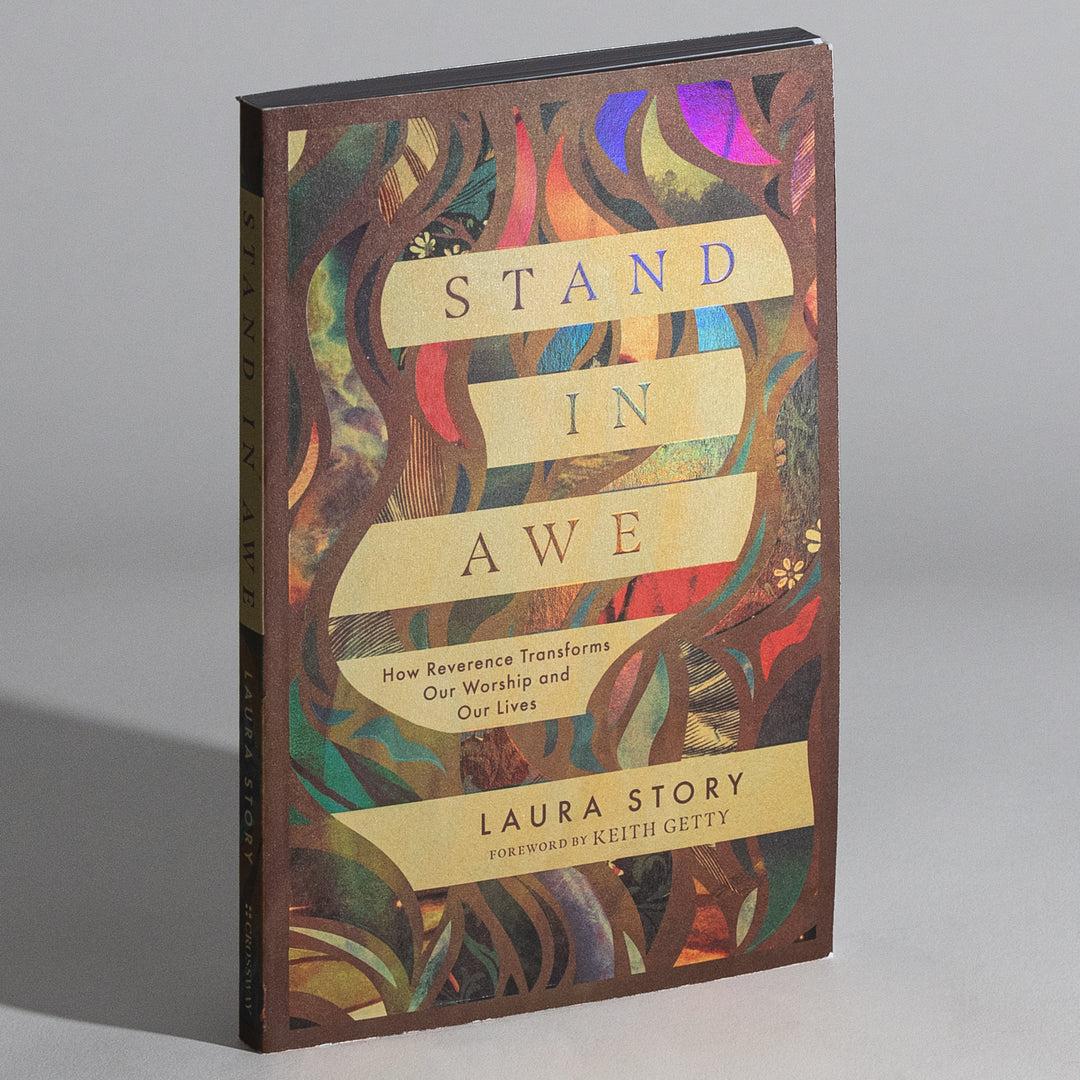 Second angled view of the paperback cover of &
