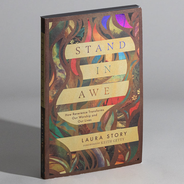 Second angled view of the paperback cover of &