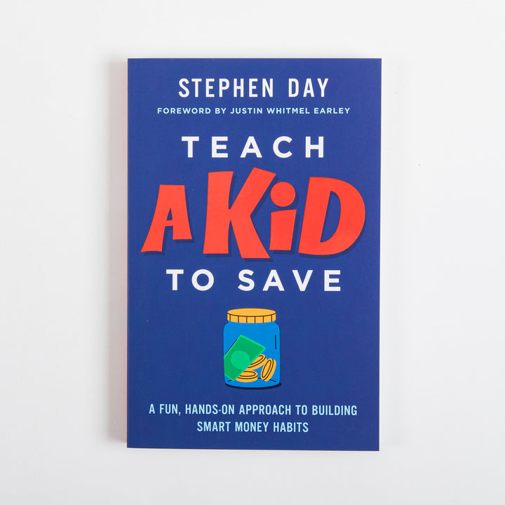 Front cover of the paperback book Teach a Kid to Save by Stephen Day, photographed flat on a white background. Navy blue cover features &