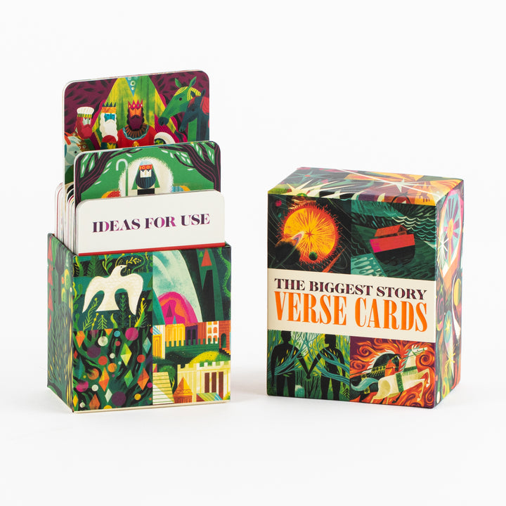 The card box shown beside its open card tray, with cards fanned upward including a cream &