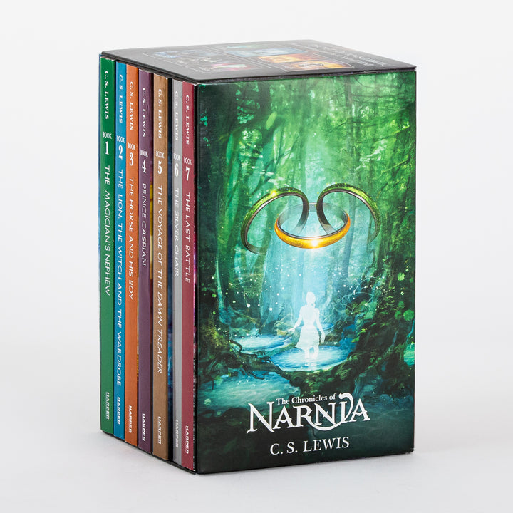 The Chronicles of Narnia 7-Book Box Set by C.S. Lewis, shown at a three-quarter angle with all seven paperback spines lined up on the left in book order and the box&