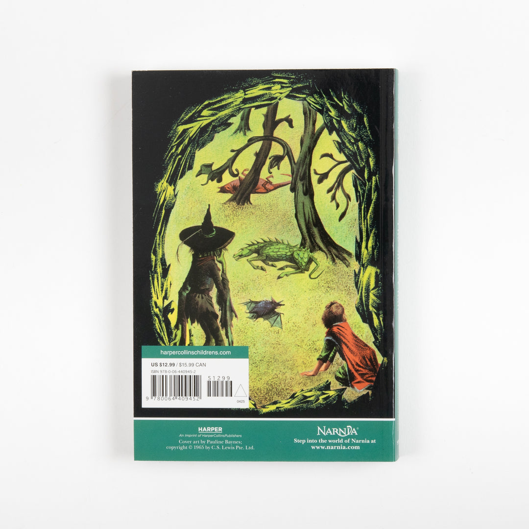 Back cover of the full-color paperback edition of The Silver Chair, showing a green-lit cave with a hooded witch figure, a dragon-like creature, a bat, and a boy crouched at the cave mouth, with a price sticker and barcode.