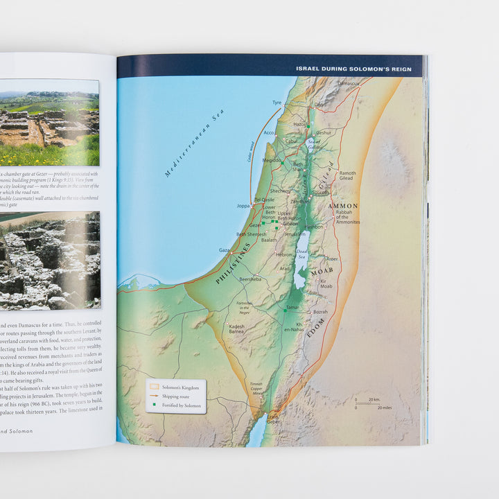 Open book spread: left page has two photographs of excavated stone ruins, including a multi-chambered ancient city gate; right page shows a full-page color topographical map titled &
