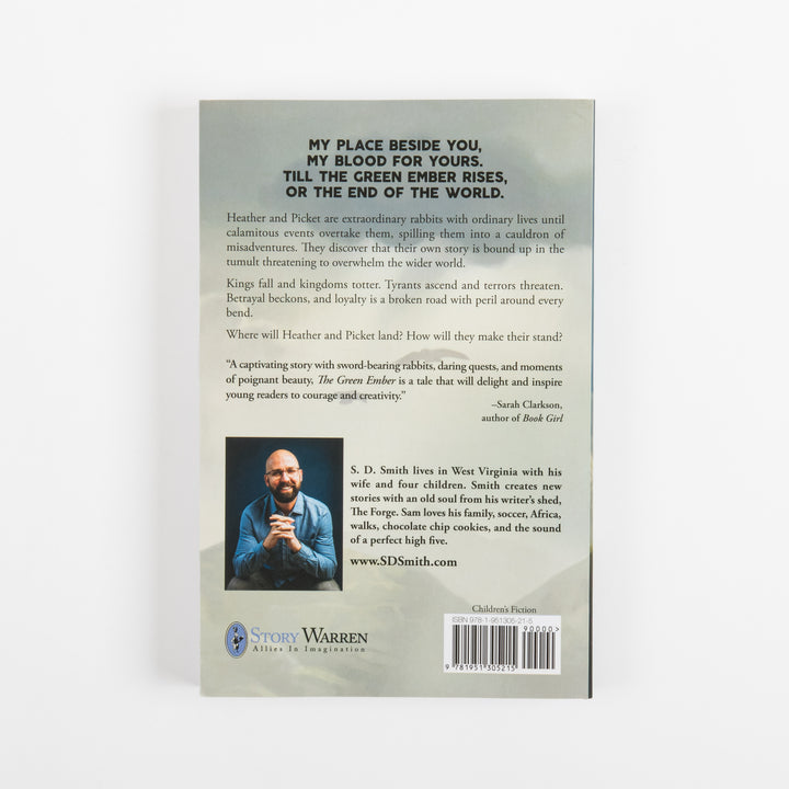 Back cover of The Green Ember paperback showing jacket copy about Heather and Picket, a blurb from Sarah Clarkson, an author photo of S. D. Smith, the Story Warren logo, and barcode.