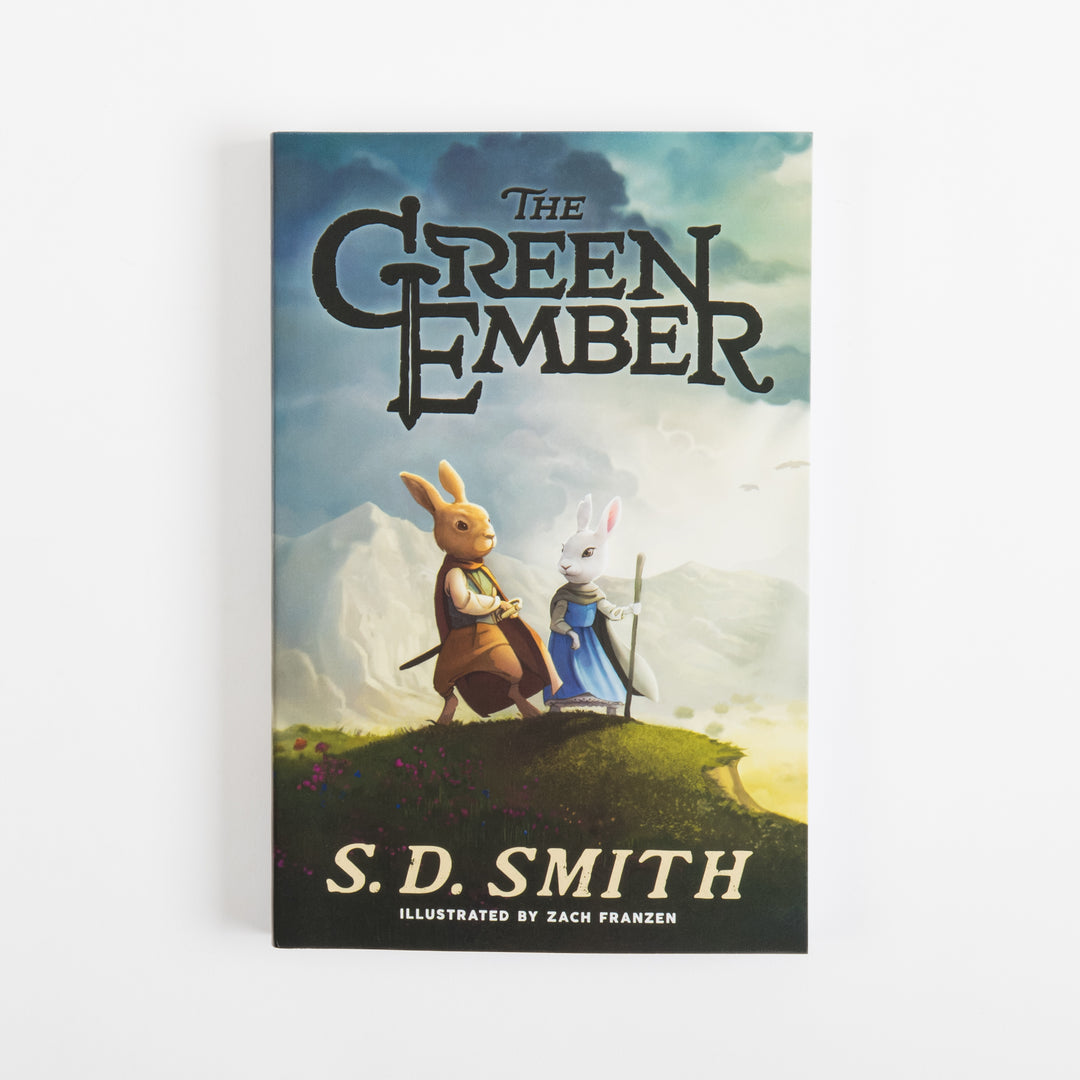 Front cover of The Green Ember by S. D. Smith, illustrated by Zach Franzen: a brown rabbit in a cloak with a sword beside a white rabbit in a blue dress holding a staff, standing on a hilltop under a cloudy sky.