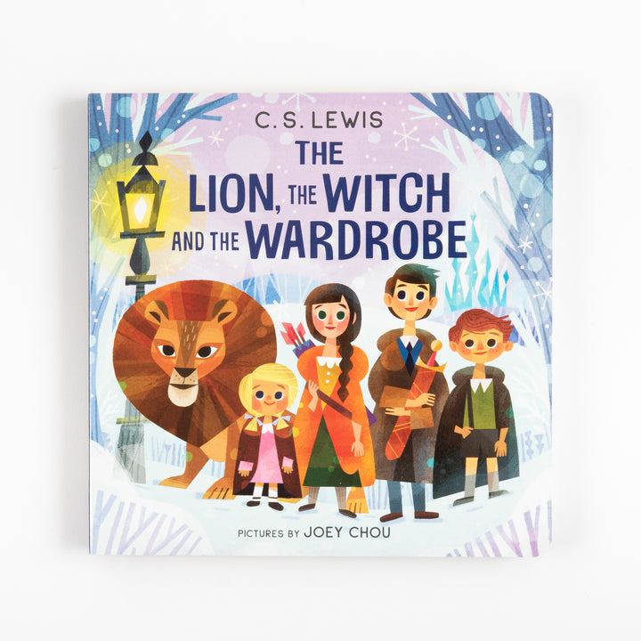 Front cover of The Lion, the Witch and the Wardrobe board book by C.S. Lewis, viewed straight on. Illustration by Joey Chou depicts Aslan the lion standing beside Lucy, Susan, Peter, and Edmund in winter clothing, with a glowing lamppost and snowy trees behind them against a lavender sky.