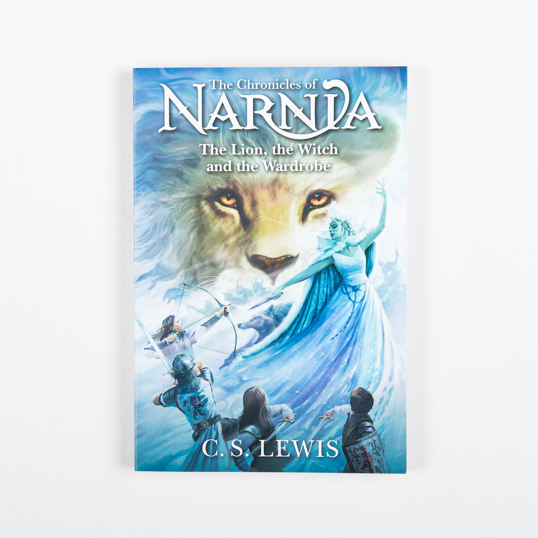 Front cover of The Chronicles of Narnia: The Lion, the Witch and the Wardrobe paperback by C.S. Lewis, showing a lion&