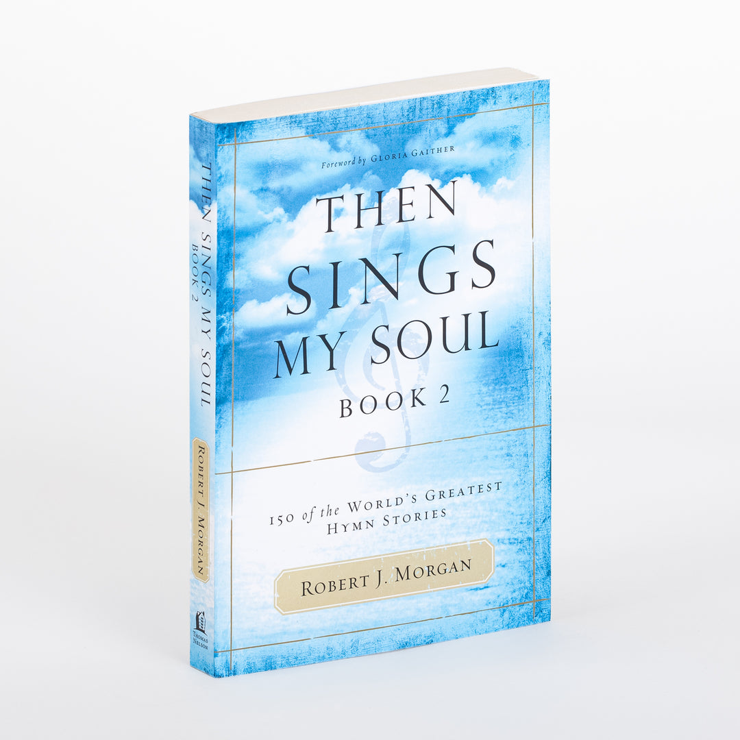 Front cover of 'Then Sings My Soul, Book 2: 150 of the World's Greatest Hymn Stories' by Robert J. Morgan, shown at an angle. Blue sky-and-clouds design with a faint gold treble clef, thin gold border lines, and a tan label with the author's name; 'Foreword by Gloria Gaither' appears at the top.