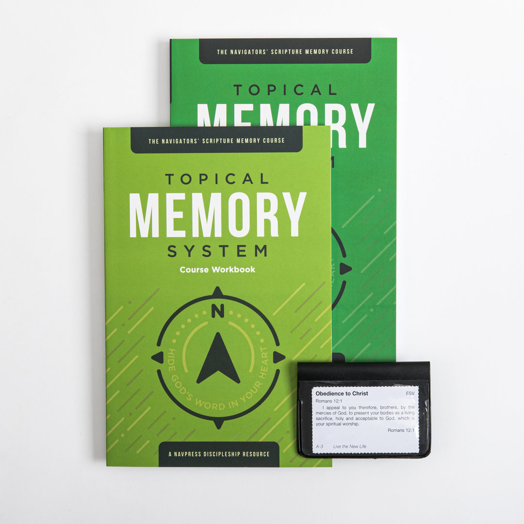 Two green Topical Memory System Course Workbook covers stacked at an angle beside a small black vinyl verse-card pouch. A white memory card peeking out reads 'Obedience to Christ,' Romans 12:1, quoted in the ESV.